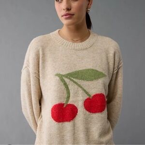 American Eagle Outfitters Beige Crewneck Sweater with Red Cherry Graphic